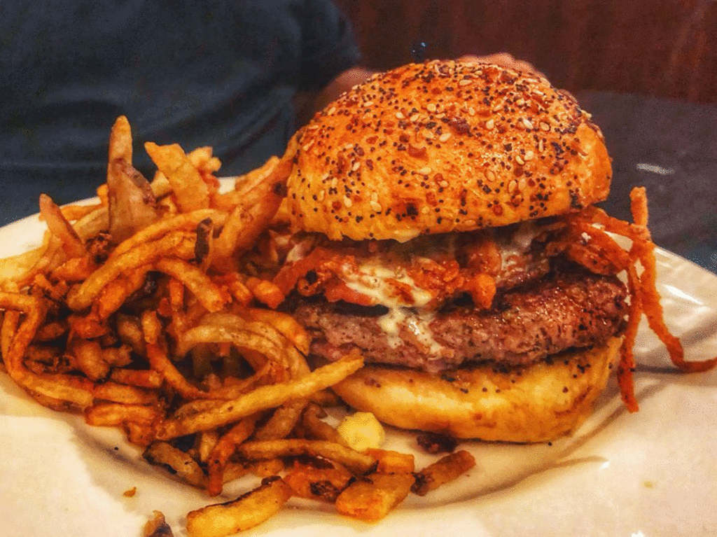 burger with fries on a plate