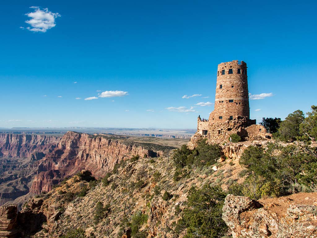 wide view of the grand canyon landscape with the desert view watchtower on the right